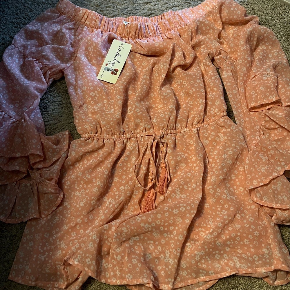 Brand new romper. Size medium.